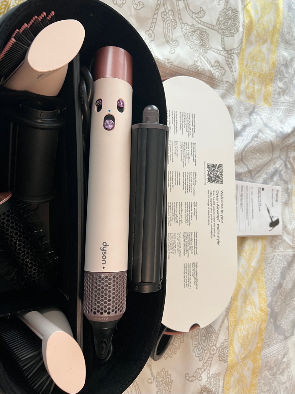 Dyson air wrap multi styler styling set in blush pink with rose-gold accents